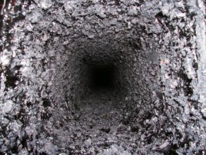 A flue coated in tar and creosote